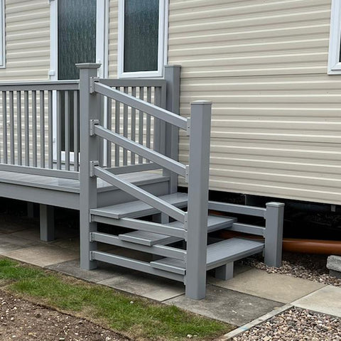 An example of a fully installed 8' x 3' entry platform with steps in the light grey colour