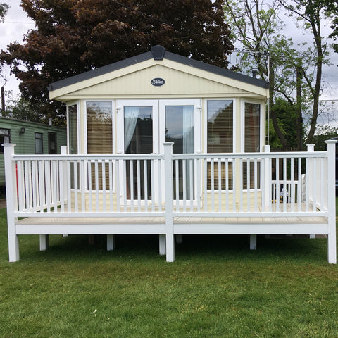 An example of a fully installed 16' x 8' end patio in the white and tan colours