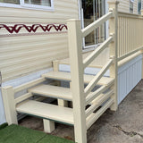 An example of a fully installed 6' x 3' 3" entry platform with steps in the cream colour